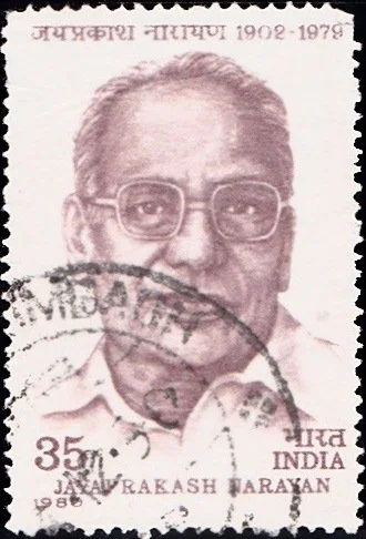 Used Indian postage stamp of 35 paise bearing a portrait of Jaya Prakash Narayan and the dates 1902 to 1979, with a postal cancellation across it